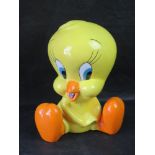 A Warner Bros Tweety Pie money box with stopper, c1990s.