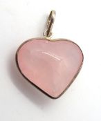 A silver and Rose Quartz heart pendant.