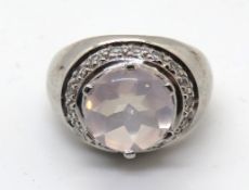 A 925 silver ring, light pink central stone, size L.
