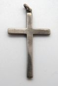 A silver cross pendant with makers mark for AJH.