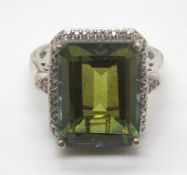 A 925 silver and green stone cocktail ring size P.