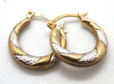 A pair of 9ct gold hoop earrings, 0.6g.