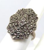 A 925 silver marcasite ring, size M, stamped Sterling made in USA.