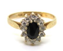A classic 9ct gold sapphire cluster ring of floral form, hallmarked 375, size K, 1.9g.