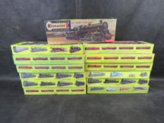 A quantity of Kitmaster scale model railway carriages and locomotive kits.