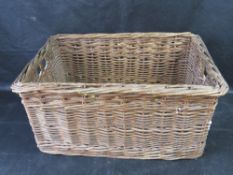A wicker log basket.