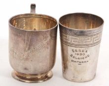 Mixed Lot: A George V silver mug of plain baluster form, presentation engraved, hallmarked for
