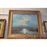 Ducks in flight by C Inness, oil on board, gilt framed