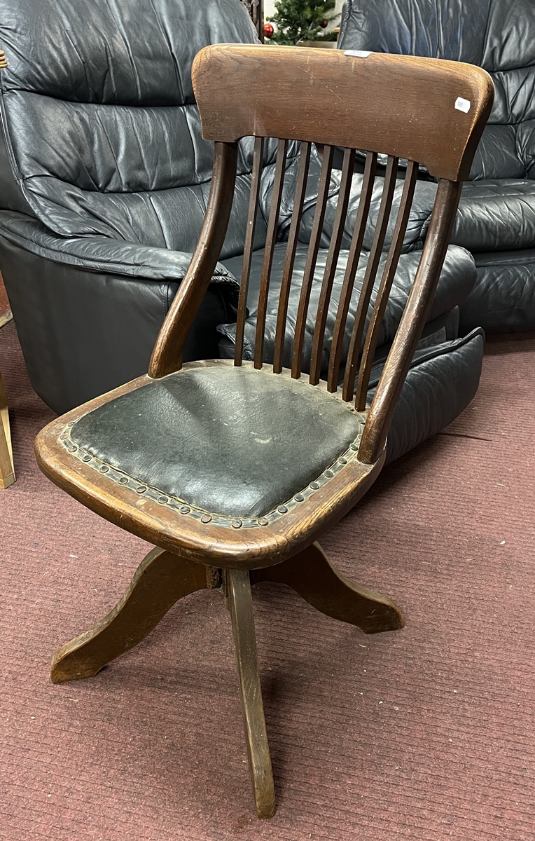 Antique oak swivel chair