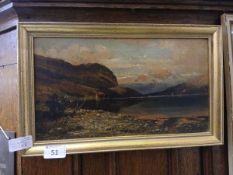 A framed and glazed painting of lock scene signed T Moss