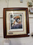 A framed and glazed limited edition print of boxer dog puppy signed John Trickett