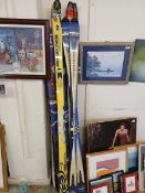 A collection of skis by various makers to include Rossignol