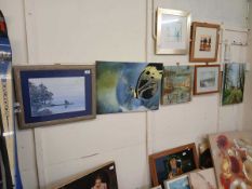 An assortment of five artworks on various subjects