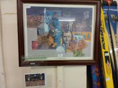 A framed Live Aid commemorative print with associated postcard