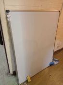 Two whiteboards with assorted pens, eraser, etc