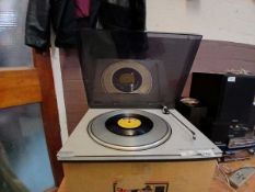 A Bang and Olufsen Beogram 2000 turntable with other box