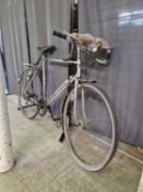 A silver Sunwasp 'Champion' ten speed bicycle