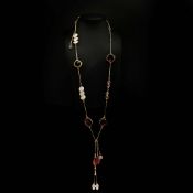 A SWAROVSKI GILT METAL AND FACETED GLASS NECKLACE.