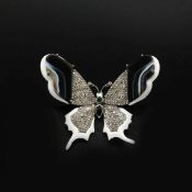 A SILVER BUTTERFLY BROOCH.