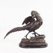 A BRONZE OF AN ANGRY PHEASANT STARTLED BY A LIZARD.
