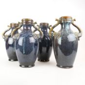 SELECTED BY PAOLO MOSCHINO ELEPHANT VASES, A SET OF 4.