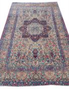 ANTIQUE PERSIAN KERMAN LAVER RUG.