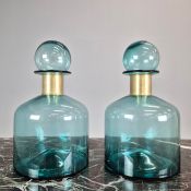 PAIR OF TURQUOISE GLASS CHEMIST BOTTLES.