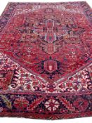 ANTIQUE PERSIAN HERIZ CARPET.