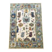 CONTEMPORARY OUSHAK CARPET.