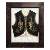 ANTIQUE FRAMED WAISTCOAT.