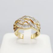 AN 18CT GOLD DIAMOND DRESS RING.