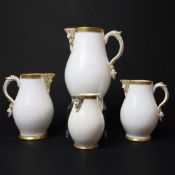 A GRADUATED SET OF FOUR CONTINENTAL PORCELAIN AND GILT DECORATED JUGS (4).