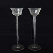 A LARGE PAIR OF TWISTED STEM CANDLESTICKS (2).