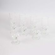 A LALIQUE SET OF EIGHT WINE GLASSES.