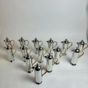 NICK MUNRO. A LARGE COLLECTION OF COFFEE POTS. (QTY).