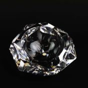 A BACCARAT CRYSTAL FACETED ASHTRAY.