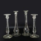 A PAIR OF CUT GLASS CANDLESTICKS (4).