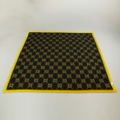 A LARGE GUCCI BLANKET.