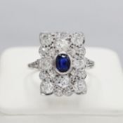 AN 18CT WHITE GOLD SAPPHIRE AND DIAMOND DRESS RING.