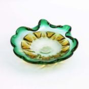 A MURANO STYLE GREEN GLASS BOWL.