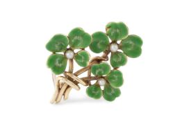 An early 20th century enamel and seed pearl brooch, modelled as a spray of four-leaf clovers, each