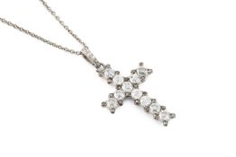 A diamond cross pendant on chain, the intersecting lines of old-cut diamonds framed by lasque-cut