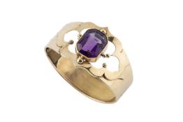 An amethyst set bangle, the hinged oval bangle centred with an octagonal mixed-cut amethyst in