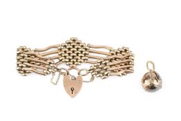 A gate-link bracelet, of part textured design, with padlock clasp stamped '9CT', and a Masonic orb