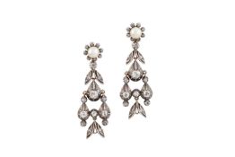 A pair of cultured pearl and diamond ear pendants, each designed as a cultured pearl and lasque-