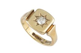 A diamond set signet ring, the shaped rectangular panel inset with an old-cut diamond in star