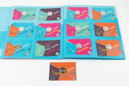A Royal Mint collection of 29 Olympics 2012 sports fifty pence pieces, plus completer medallion,