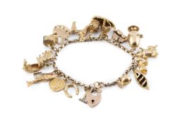 A charm bracelet, the belcher-link bracelet with padlock clasp, suspending assorted charms, to