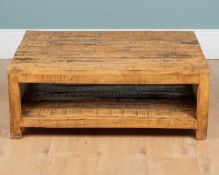 A Contemporary hardwood coffee table