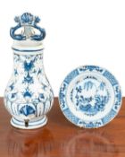 A late 18th/early 19th century faience wall-mounted cistern